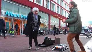 Watch Her Dance To His Street Music!