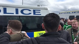 Celtic fans doing the huddle around a police van blocking the road! Rangers VS Celtic [5-1]