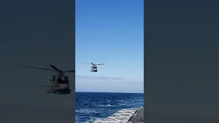 Royal Navy Helicopter Low Pass Over Warship