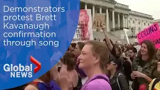 Demonstrators sing out protest of Brett Kavanaugh confirmation