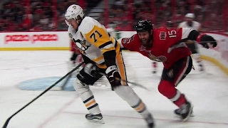Malkin fights off Smith and slides puck past Anderson