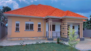 Touring a 4 bedrooms bungalow in Kitende entebbe road at 750MILLION. CALL +256701541291