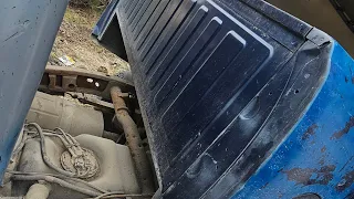 getting truck box repaired with sanding down the frame of the truck