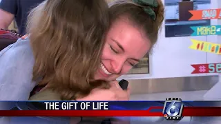 Emotional meeting of bone marrow transplant donor and recipient evokes tears, gratitude