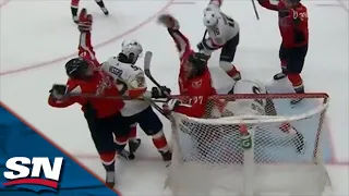 T.J. Oshie Whacks Puck Out Of Mid-Air To Cap Off Chaotic Goal Sequence