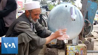 Afghanistan Store Owners Use Mobile Hand Washing Stations to Fight Coronavirus