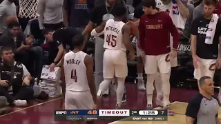 Donovan Mitchell nearly injures himself after jumping into crowd for lose ball!