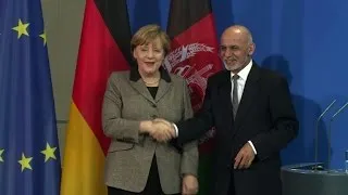 German, Afghan leaders pledge to reduce migrant flows