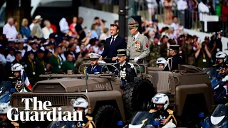 Emmanuel Macron is booed during Bastille Day parade in Paris