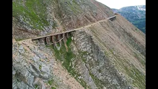 CROSSING an abandoned train trestle HIGH in the Rockies