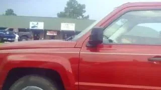 Small guy getting into large truck