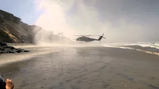 Military helicopter makes emergency landing on San Diego beach.