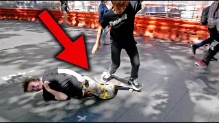 SKATEBOARDER TRIED TO JUMP OVER ME...*OUCH*