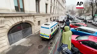 Andrew Tate leaves Bucharest court in handcuffs