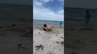 Sleeping yoga pose at the beach! #shorts #short #yoga #beach #sleep #flexibility #yogapose