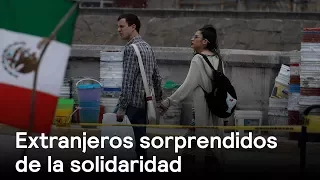 Extranjeros sorprendidos de la solidaridad - Foro Global