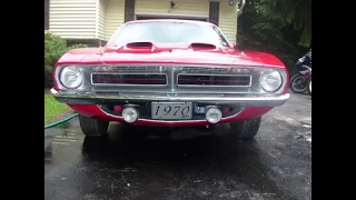 My 1970 Plymouth Cuda 440 matching numbers 4 speed car. Tic Toc Tac pistol grip rally red. Rare car!