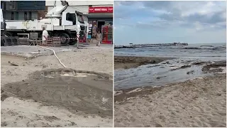 Plazh mes betonit/ Skandal në Durrës, firma e ndërtimit shkarkon inertet te çadrat e turistëve