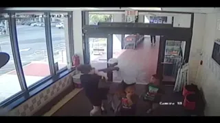 Shocking video shows man attack woman entering Florida grocery store with her 3 children