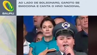 Ao lado de Bolsonaro, garoto se emociona e canta o hino nacional
