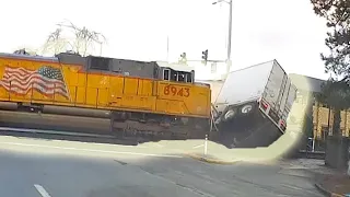 Train Collides With Truck's Trailer