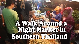 Street Food at a Night Market in Southern Thailand. A walk around a Thai market in Satun. Thai Food