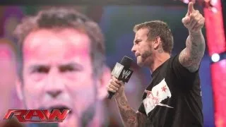 CM Punk challenges Brock Lesnar to a match at SummerSlam: Raw, July 22, 2013