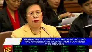 Santiago hits critics of probe, wants "manual for nincompoops"