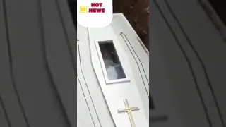 DIED BODY APPEARS TO WAVE TO PEOPLE FROM INSIDE HIS COFFIN....THE MUST SEE!!!!!!