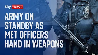 Met Police: Army on standby as officers hand in weapons