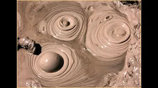 Mud pots / Mud volcano Geyser in Yellowstone National Park - 4K High Definition (HD)