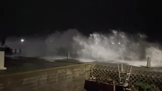 Big waves crash over Pacifica pier and street in California super storm