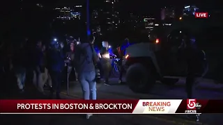 Protesters force National Guard vehicle away from Massachusetts State House