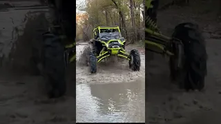 Side By Sides Playing in the Mud