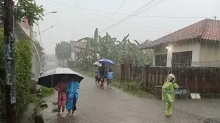 very heavy rain in a beautiful small Indonesian town suitable for sleeping