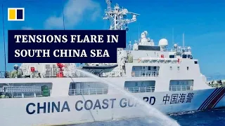Philippines accuses Chinese coastguard of firing water cannons at its vessels in disputed waters