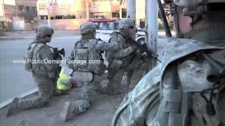 Iraq War archival stock footage - Patrolling streets of Baghdad Morning 1