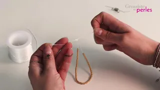 Technique de base pour créer des bijoux: astuce pour faire un noeud dans votre fil élastique