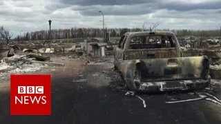 A look inside devastated Fort McMurray - BBC News