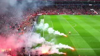 Marseille and Galatasaray fans hurling flares at each other