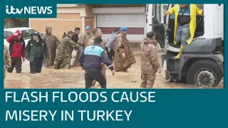 Flash floods cause misery for thousands already made homeless by earthquakes in Turkey | ITV News