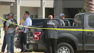 Suspect dies at North Freeway motel while officials tried to arrest a murder suspect, authoritie...