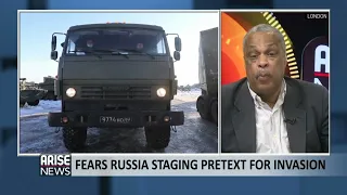 FEARS RUSSIA STAGING PRETEXT FOR INVASION