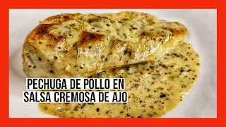 PECHUGAS DE POLLO EN SALSA CREMOSA DE AJO. Chicken breasts in creamy garlic sauce.