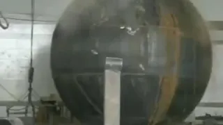 Explosively hydroforming a steel sphere