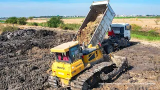 Wonderful Shantui DH17 Bulldozer Pushes And Moving Mud Into The Water & Dump Truck Unloading Soil