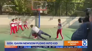 California Gov. Gavin Newsom plows into child while playing basketball in China 