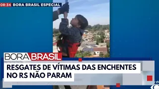 Enchentes no RS: crianças e idosos são resgatados