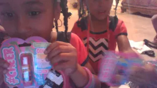 the twins opening gifts from Bebe on their 5th birthday