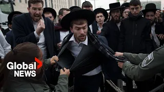 "We prefer to die": Ultra Orthodox Jews scuffle with Israeli police over possible conscription